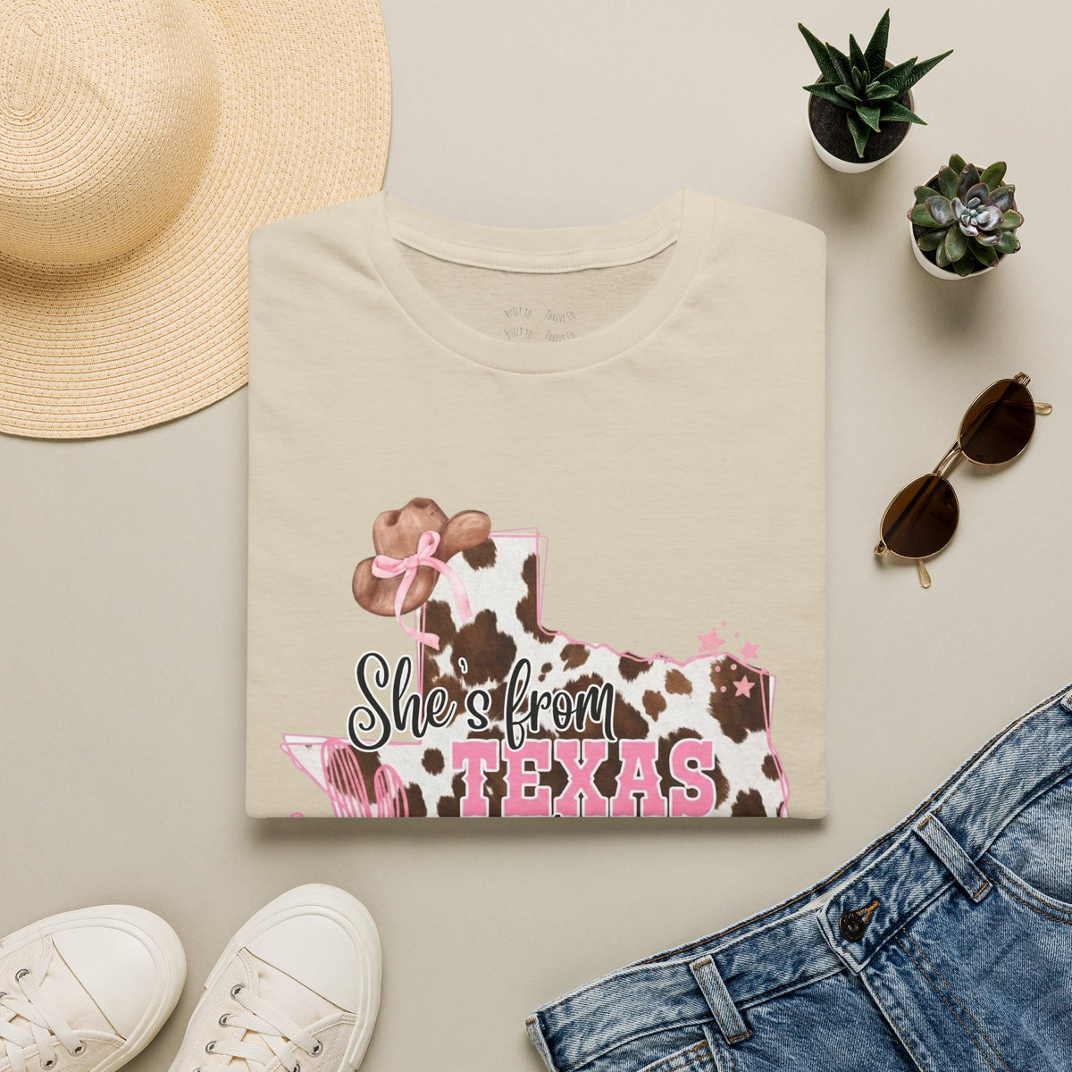 She’s From Texas Cowhide State T-Shirt — Pink Floral Lone Star Tee