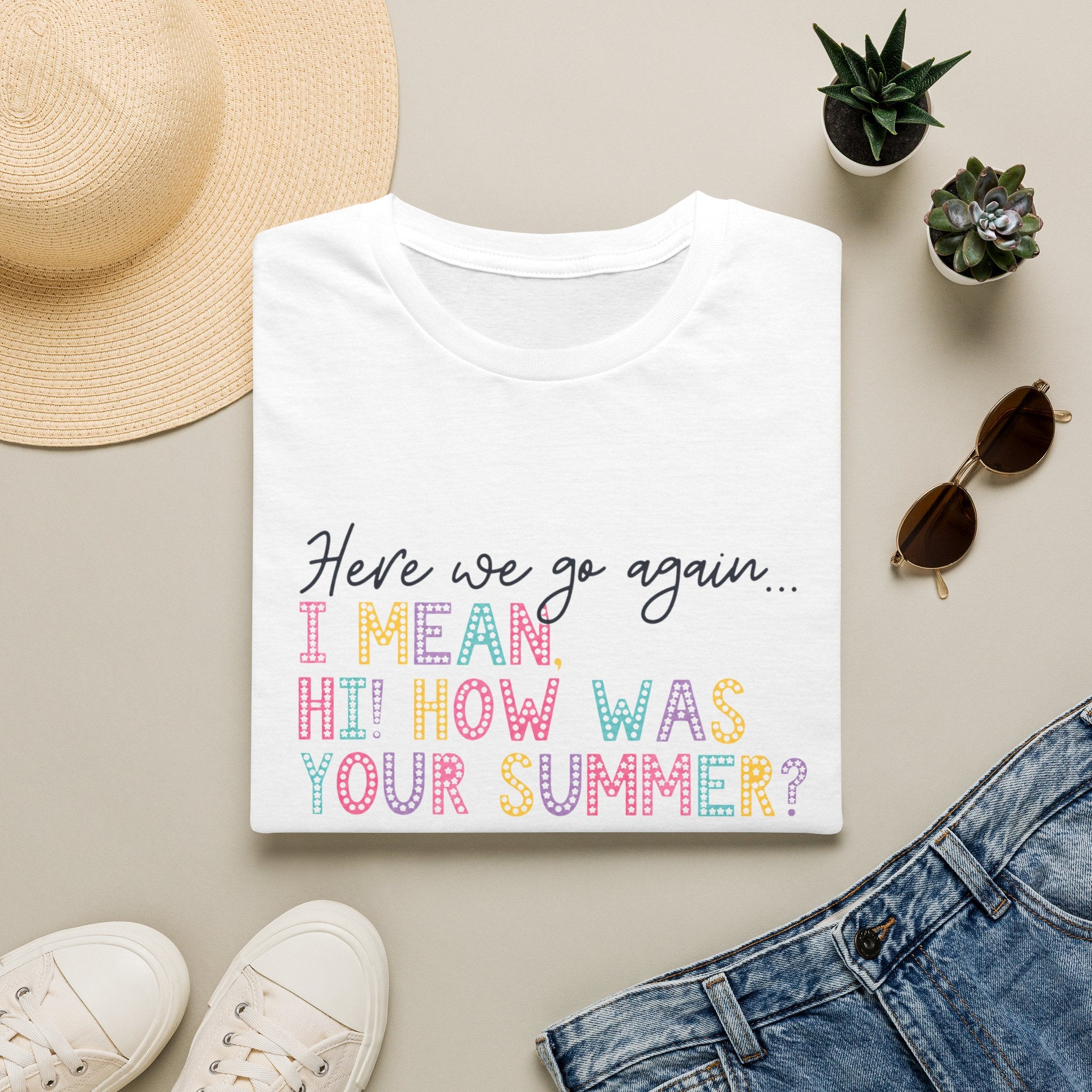 T-Shirt — "Here We Go Again… I Mean Hi! How Was Your Summer?" Playful Pastel Summer Reunion Tee