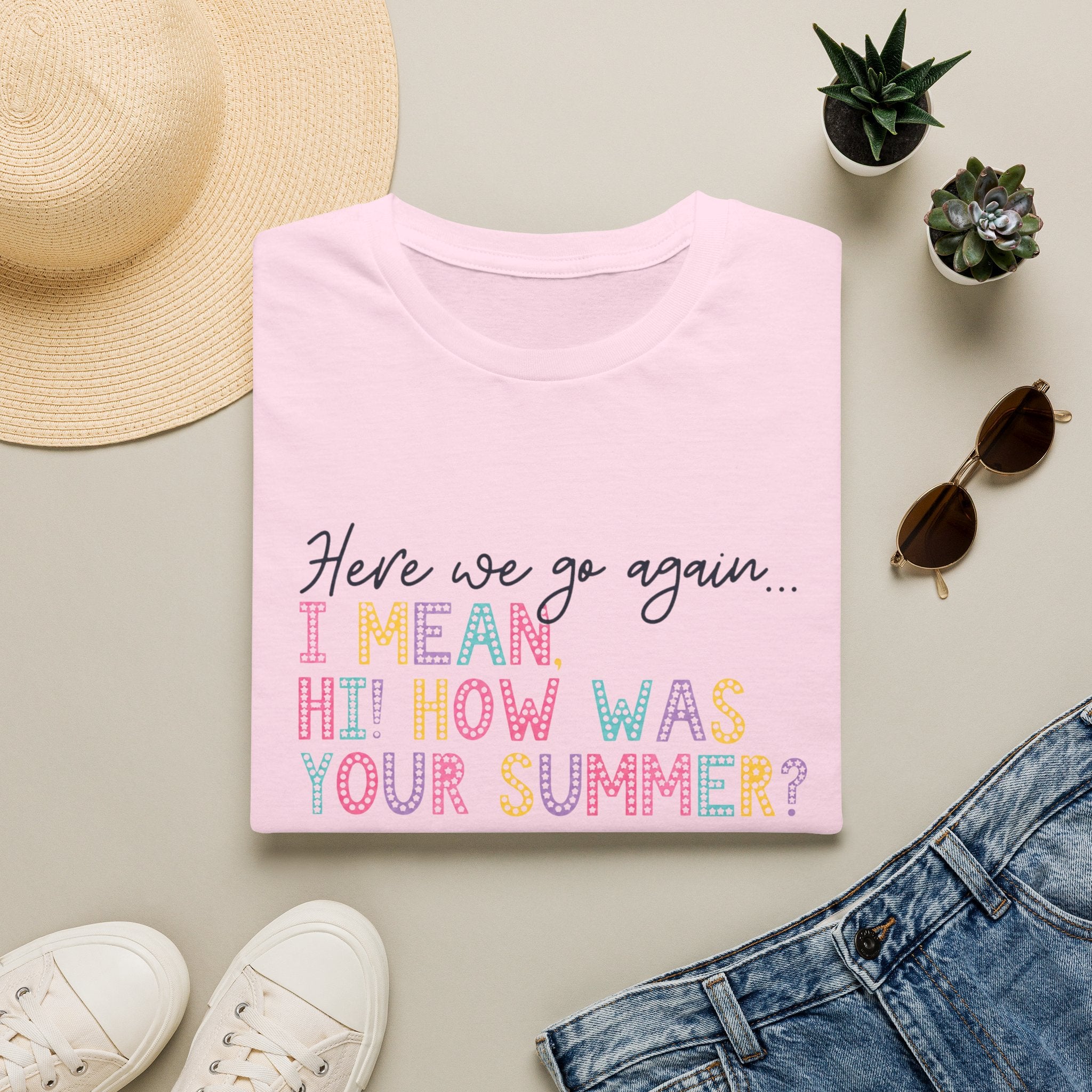 T-Shirt — "Here We Go Again… I Mean Hi! How Was Your Summer?" Playful Pastel Summer Reunion Tee