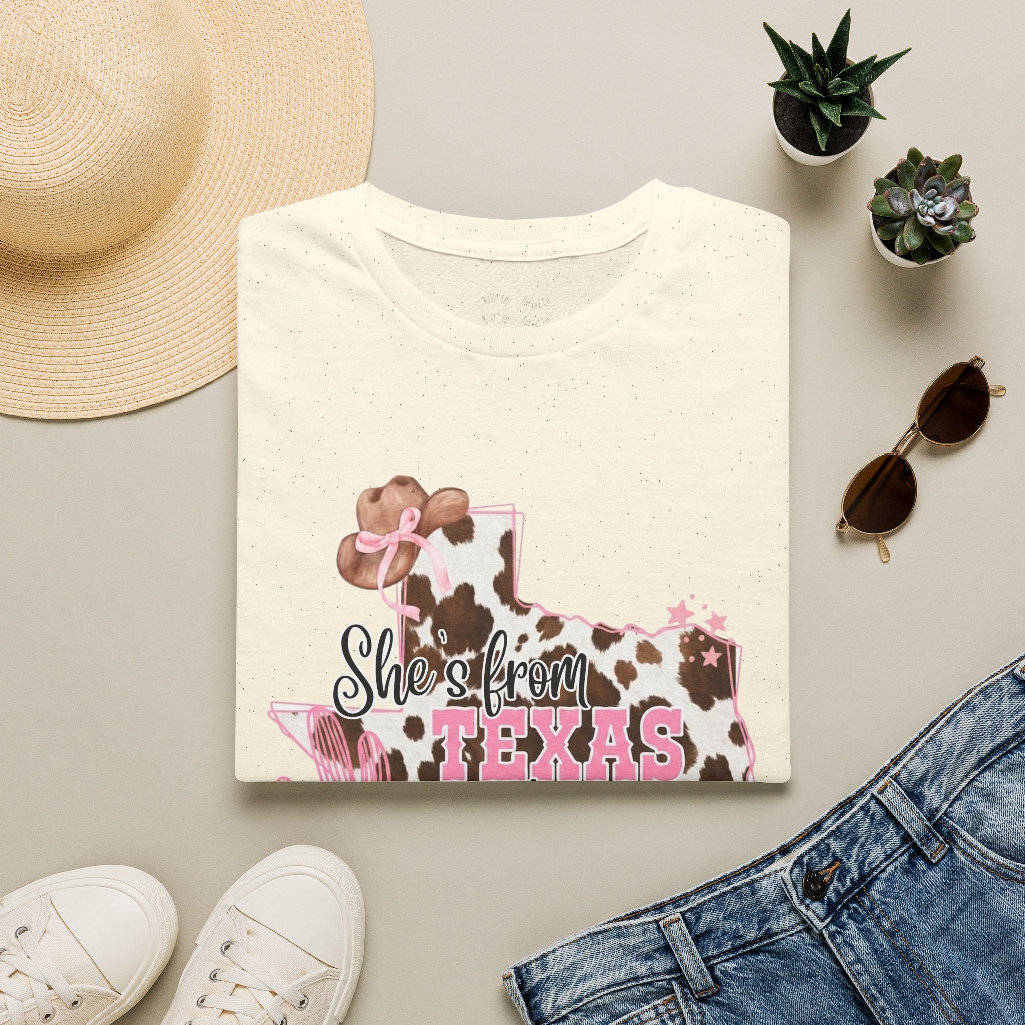She’s From Texas Cowhide State T-Shirt — Pink Floral Lone Star Tee