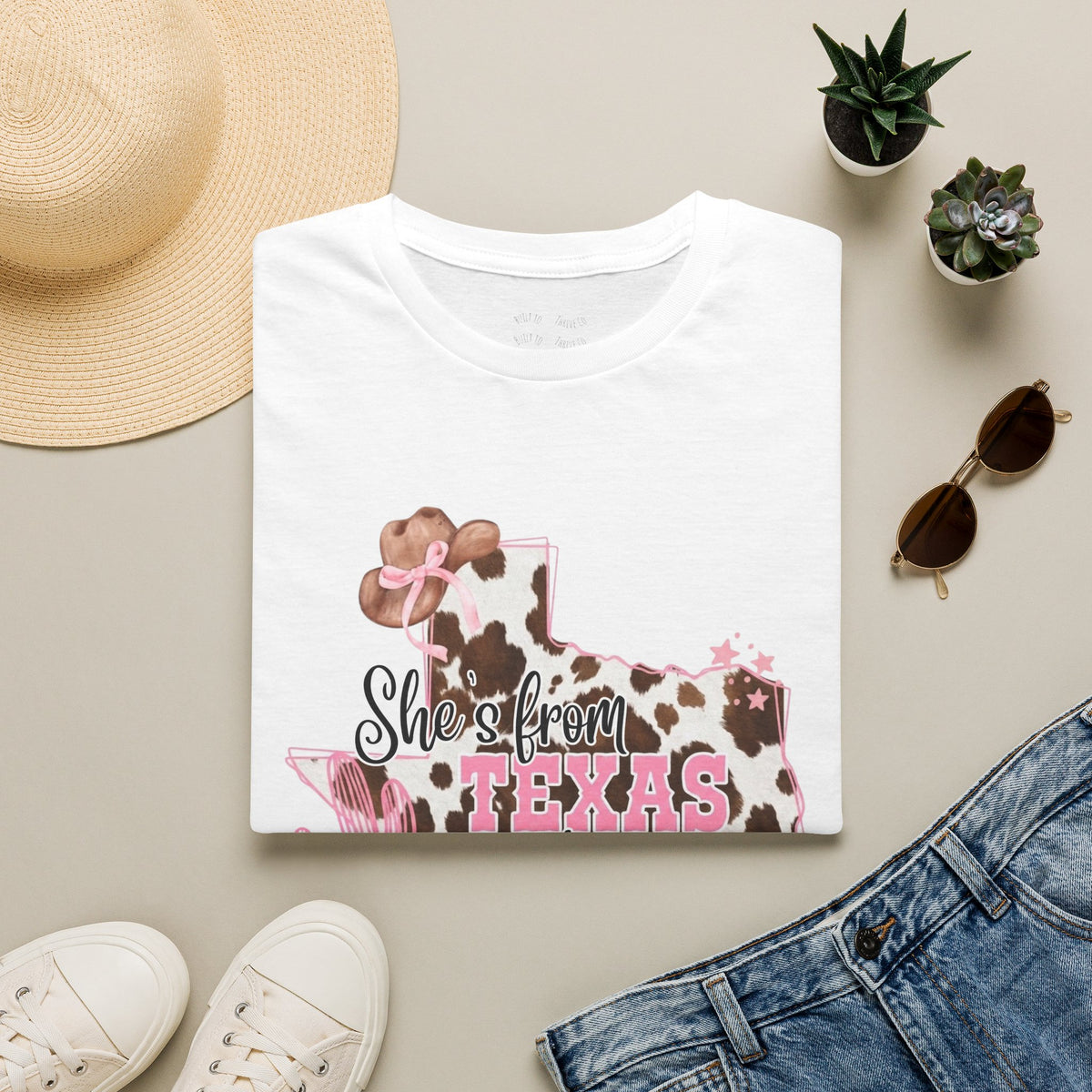 She’s From Texas Cowhide State T-Shirt — Pink Floral Lone Star Tee